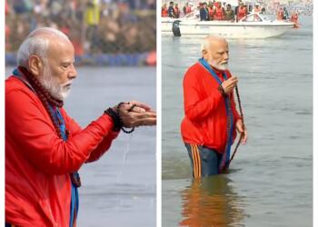 आस्था की डुबकी लगाते पीएम